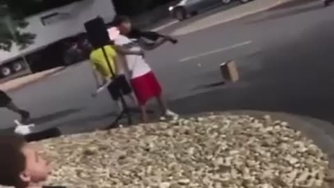 Kid plays epic violin outside walmart