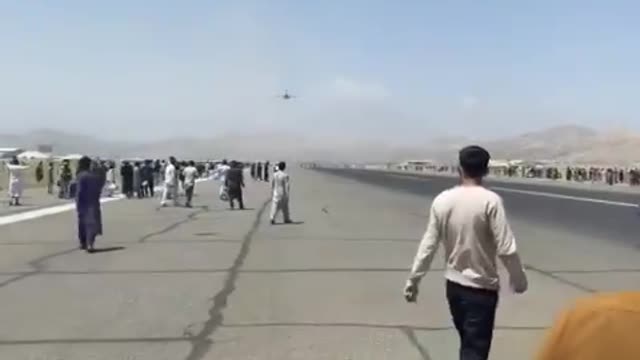 Afghan falls to his/her Death from US cargo plane