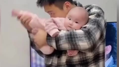 The adorable act of father and son.