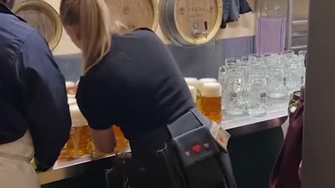 Carrying 12 giant beers at once!