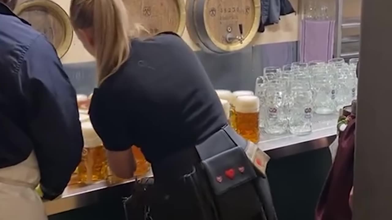 Carrying 12 giant beers at once!