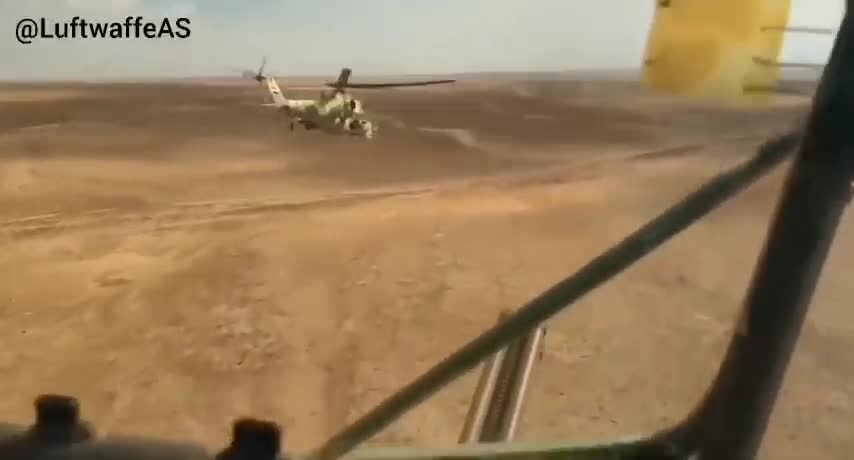 SYRIA – Combat patrol by a pair of Mi-25 helicopters of the Syrian Air Force.