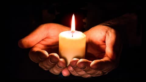 Candle in prayer