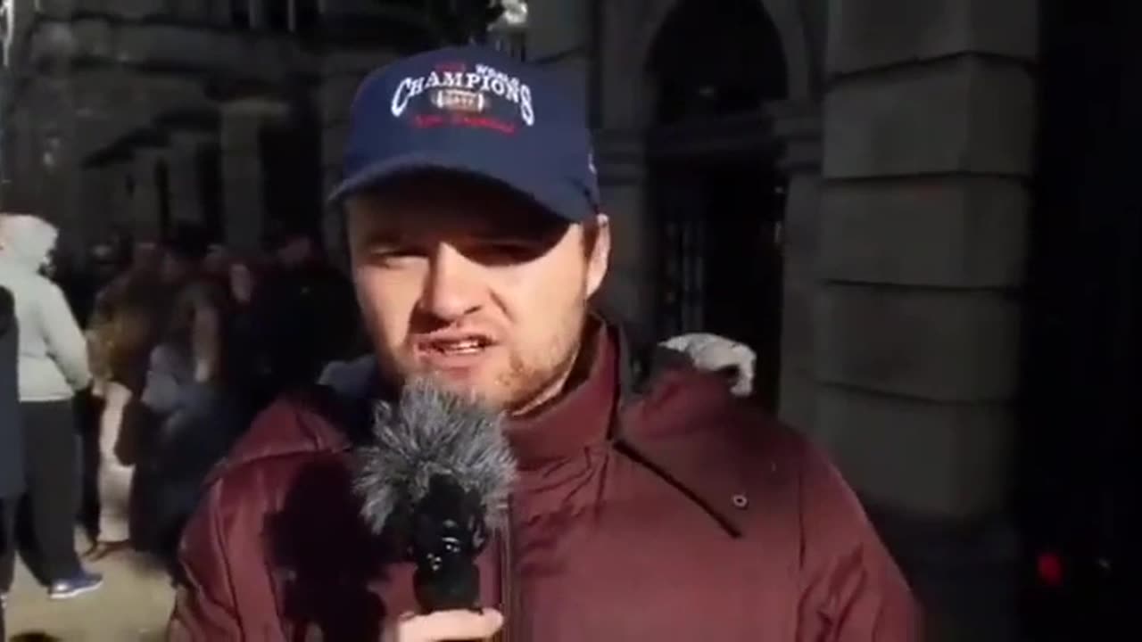 An Irishman speaks his truth outside of Parliament in Ireland - Houses of the Oireachtas