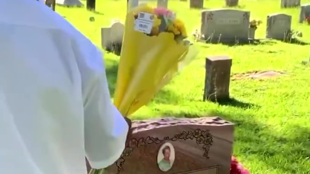 Teen with Down syndrome visits mother's grave to tell her that he graduated