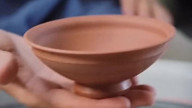 How To Trimming a Small Indented Stoneware Bowl on the Potter's Wheel