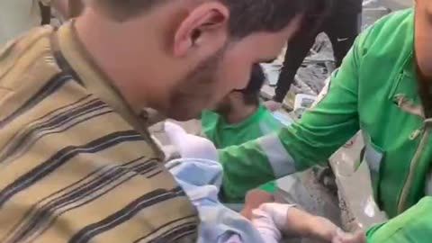 Baby Pulled from Rubble in Gaza, 10/25/2023