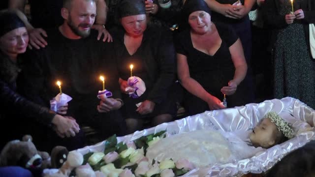 Family buries 4-year-old girl killed by Russian missile