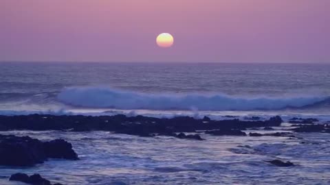 the sun kisses the ocean goodnight