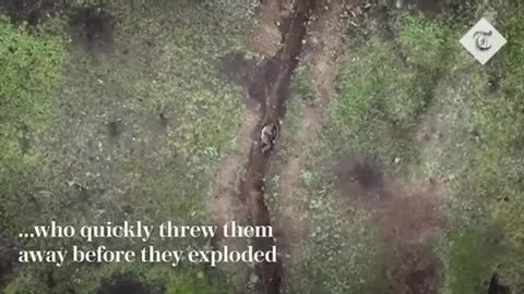 Moment Russian soldier catches and throws away Ukrainian 'drone bombs'