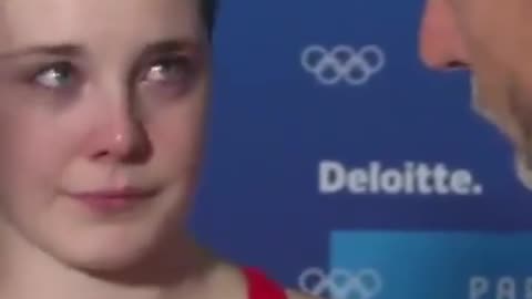 The moment a father consoles daughter after missing out on olympics medal