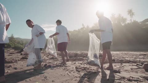 Volunteers Collecting Trash on the Beach