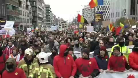 Brussels Belgium: Firefighters lead the human tide against covid passports and mandates.