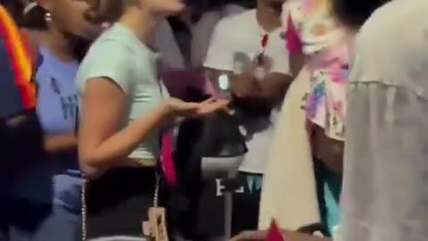 Unhinged Kamala Supporter Screams in Terrified Baby's Face During Protest