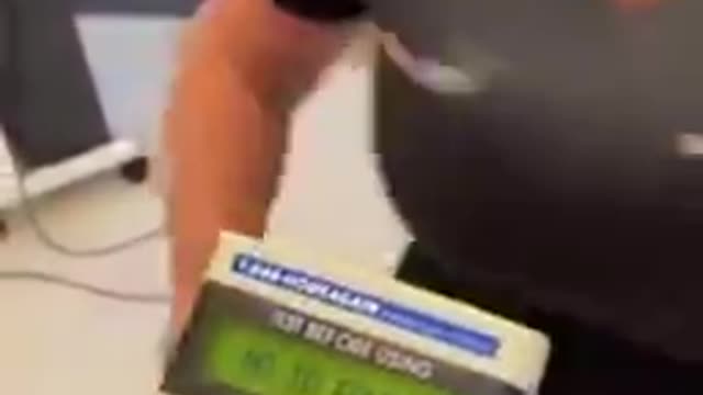 VACCINATED NURSE SCANS OWN ARM WITH PET CHIP READER FOR PETS!!