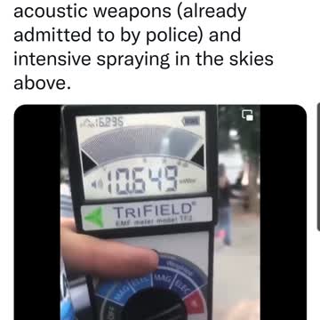 Australian with emf reader at protest