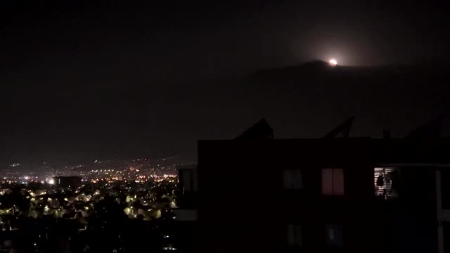 Pink Moon glows over Chilean skies