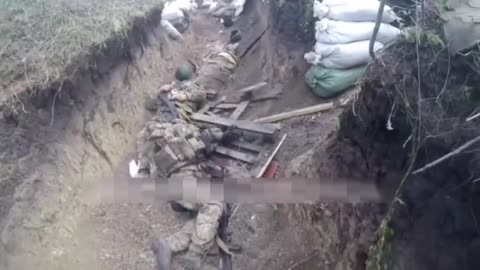 Ukrainian trench stormed by Russian troops somewhere on the front lines, location unknown