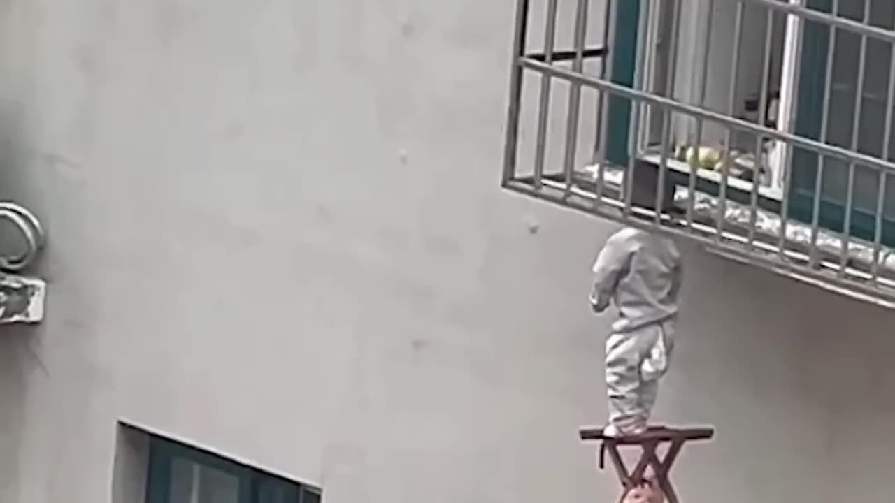 "Unbelievable Rescue: Baby Dangles from Window, See What Happens Next!"