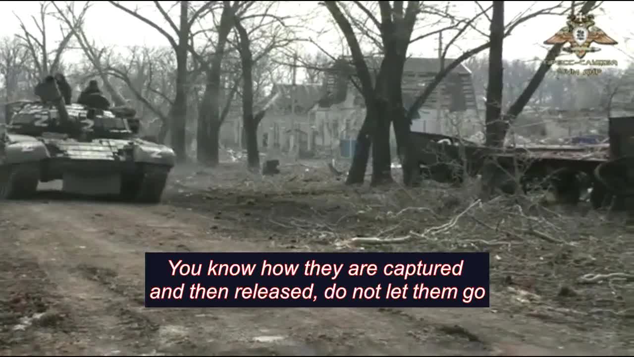 Woman telling the Russians what to do with Azov prisoners
