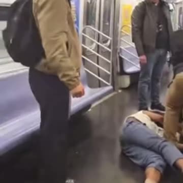 Daniel Penny and another man were seen rendering aid to Neely, who scared train passengers.