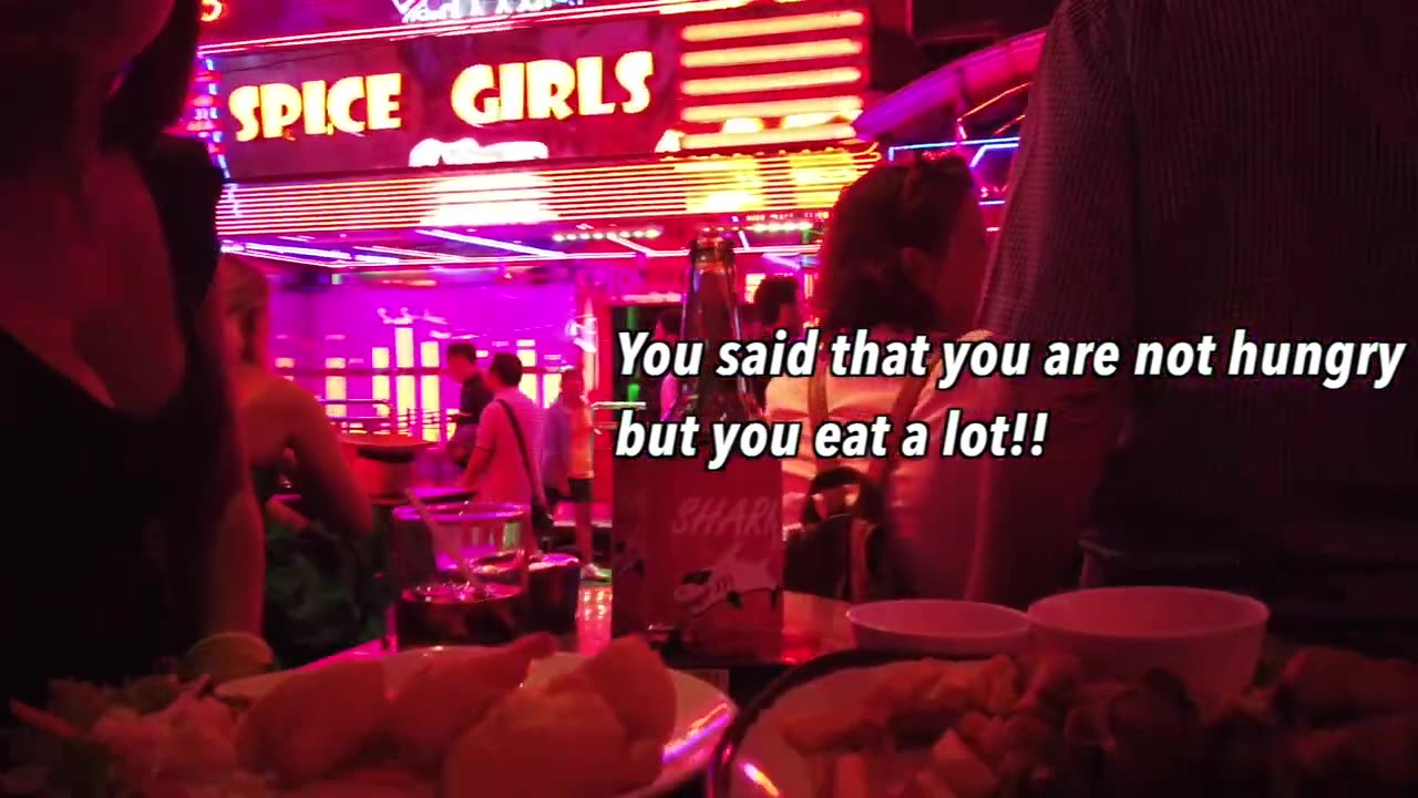 I bought fried chicken and shrimp for the bar girls in Soi Cowboy in Bangkok, Thailand