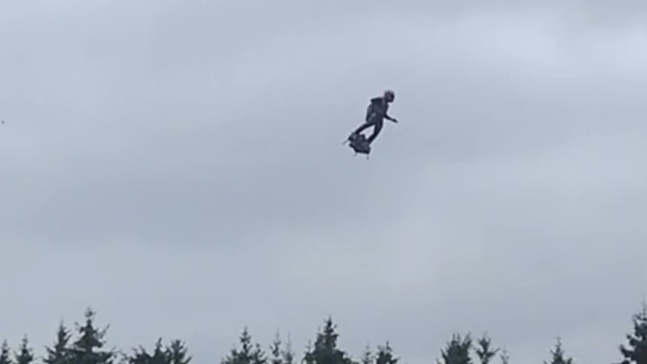 A man with Jetpack flew over the F1 cars at the 2022 Belgium Grand Prix