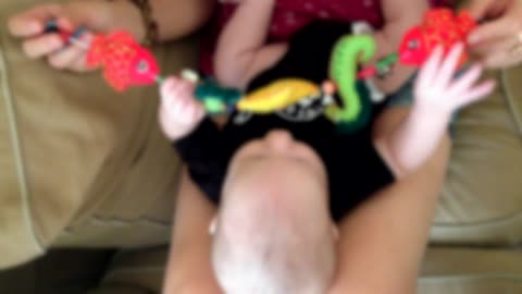 Baby boy playing mam