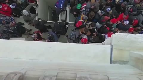 WOW: New J6 footage appears to show Antifa wearing all black attempting to break into the Capitol!