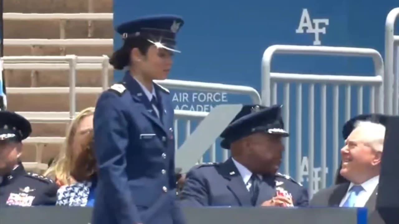 BIDEN FALLS, CADET PRETENDS NOT TO SEE