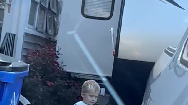 Two-Year-Old Helps Guide Trailer