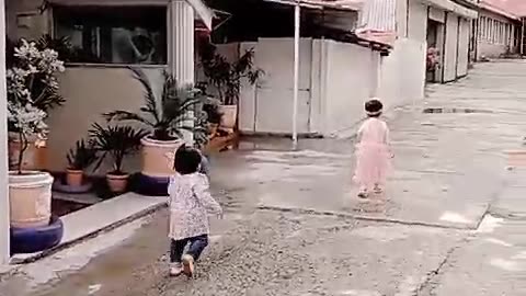 Two cute girls raceing in murree hospital cpmpound