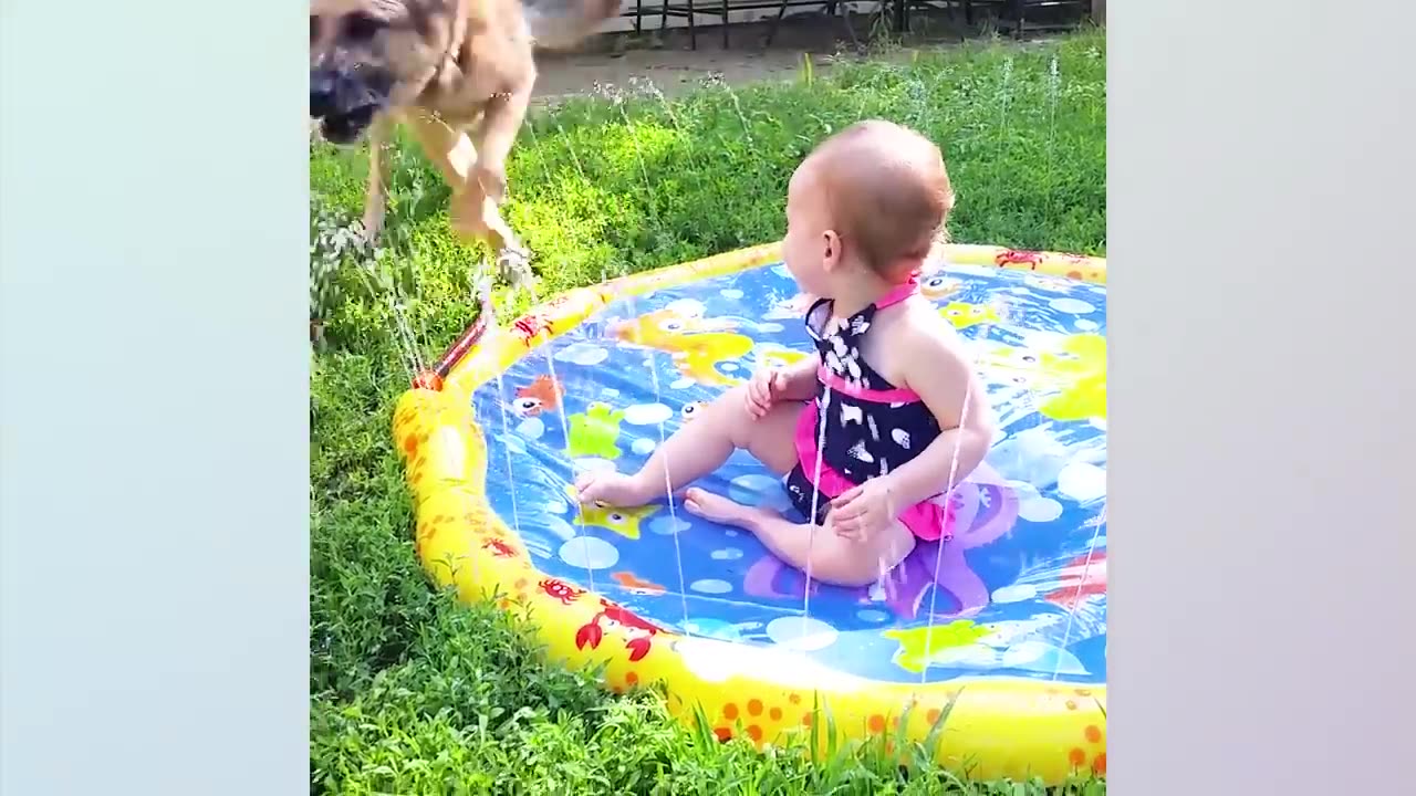 Funny baby playing with water