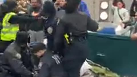 Illegal Migrants Attack NYPD Cops Making Arrest at NYC Migrant Shelter