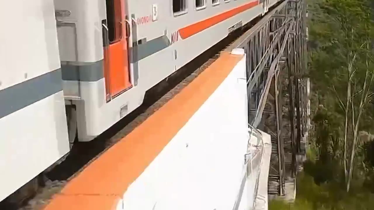 Train is passing over a very dangerous bridge😱😱