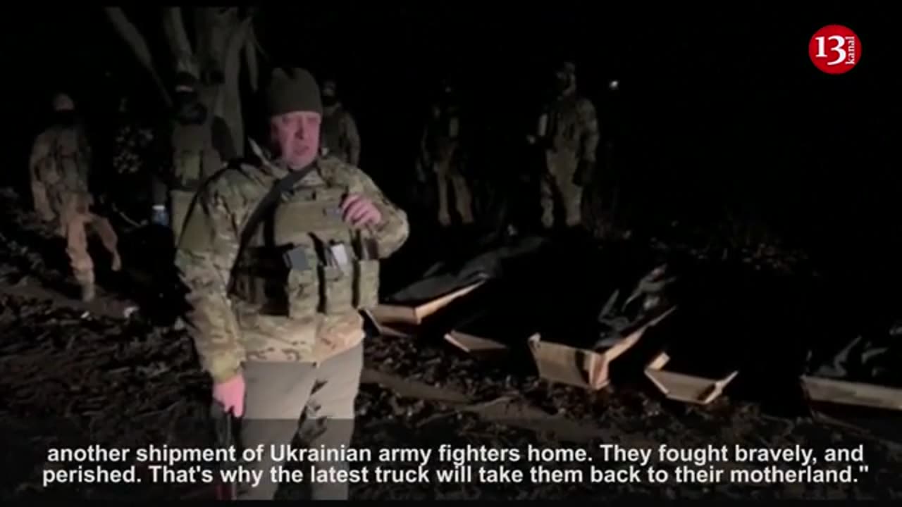 Ukraine forces loading dead bodies