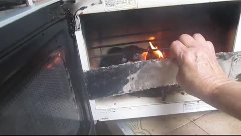 Barbie-cue made from old Microwave...