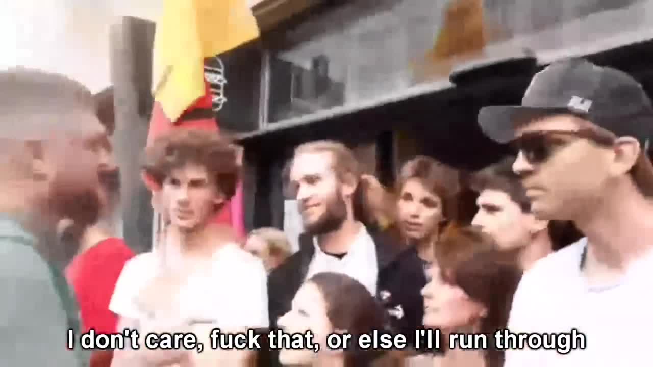 Denmark. Vegan Liberals try to block a 'meat eater' from entering a restaurant!
