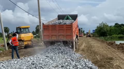 New bulldozer spreading gravel processing features building road foundation-6