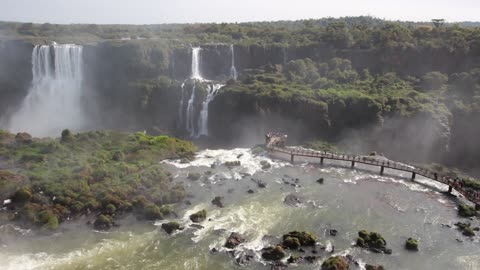 Tourist on the Waterfalls View Deck