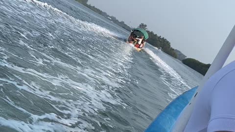 Crossing the river to get to the beach.