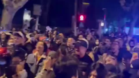 people of Shanghai chanting “Take down the CCP” in Mandarin