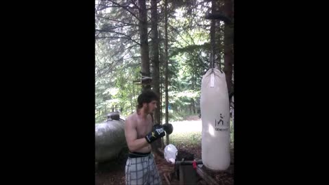 Hitting 100 lb Genesport heavybag