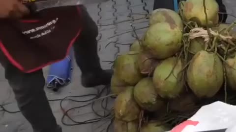 The skill of peeling coconut is superb