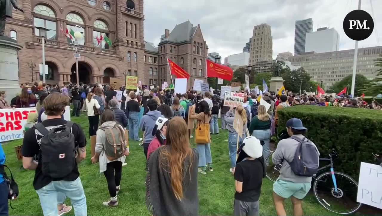 Protestors are calling for climate justice outside of Queen’s Park in Toronto for the Climate Strike