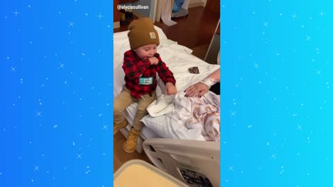 Toddler meets newborn little brother in adorable moment