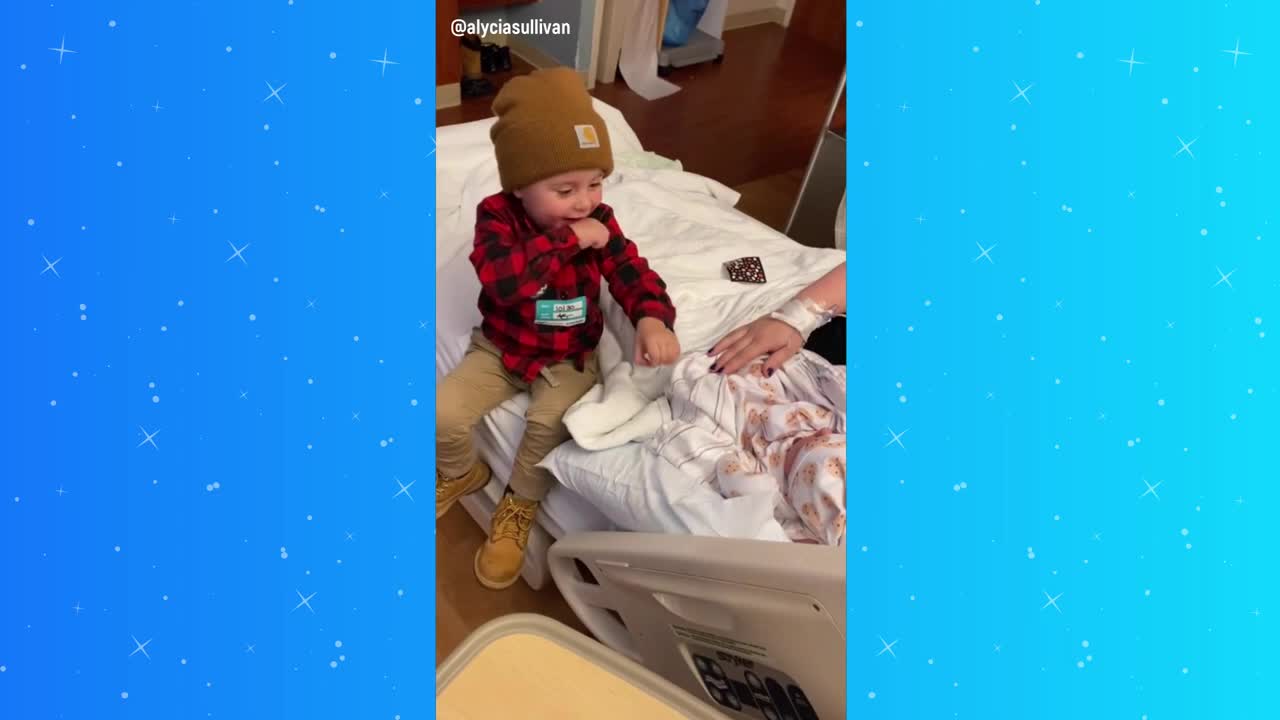 Toddler meets newborn little brother in adorable moment