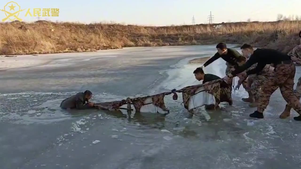 Soldiers Save Man From Frozen Pond With Camouflage Jackets