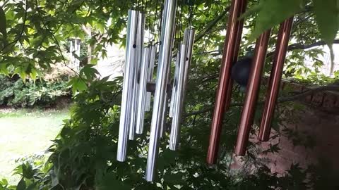 Garden wind chimes_ a moment of bliss