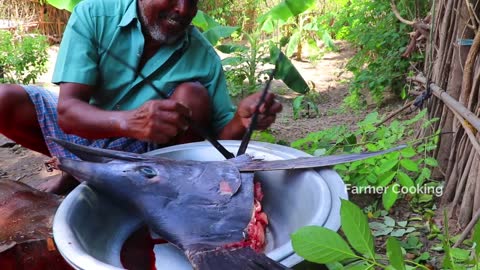 FARMER COOKING BIG FISH